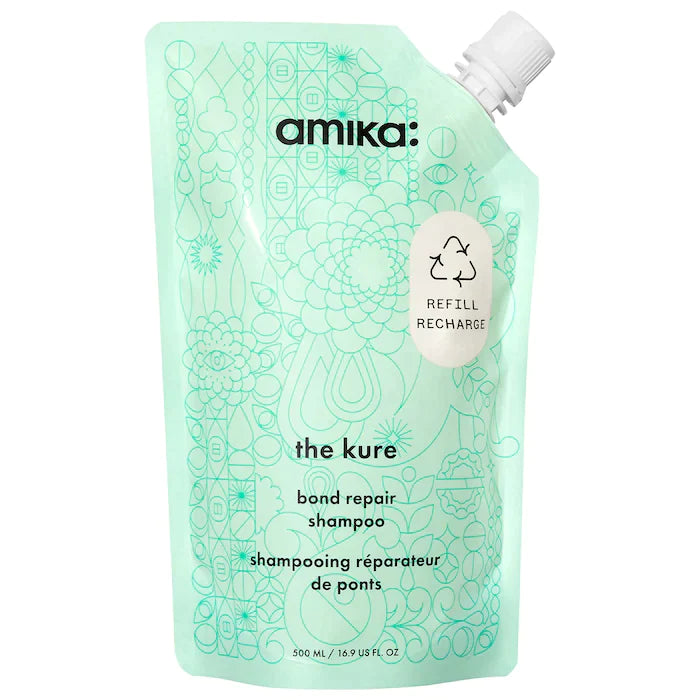 
                  
                    The Kure Repair Shampoo
                  
                